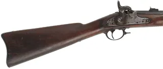 Model 1861 Special Contract Musket,
reamed to .60 smoothbore, 40" barrel, 
three bands, walnut, iron, well aged patina,
marked L.G. & Y Winstor VT